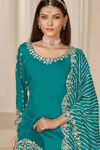 Blue roman silk zari embroidery work glass & sequins semi stitched suit size up to 42