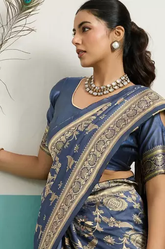 teal silk blend saree with woven meenakari floral rama blouse work
