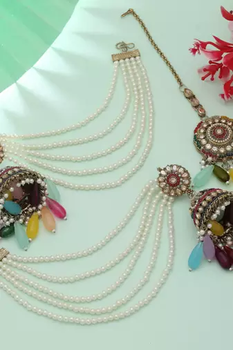 multicolor pearl kundan jhumka earrings with chain tikka set