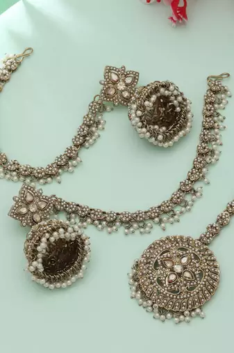 royal pearl kundan jhumka tikka set in antique gold