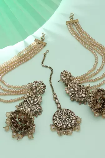 champagne kundan jhumka set with pearl chains