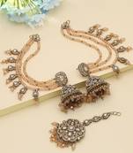 gold kundan jhumka earrings with tikka bridal set