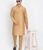 Elegant men's raw silk kurta with pants stitched golden color