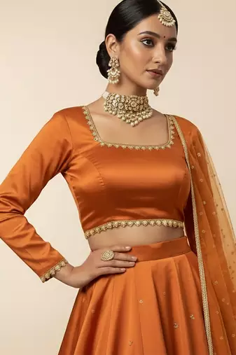 orange embroidered organza lehenga set