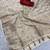 off white color zari weaving georgette silk saree for women