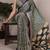 Teal color Fancy Printed Dull Satin Saree