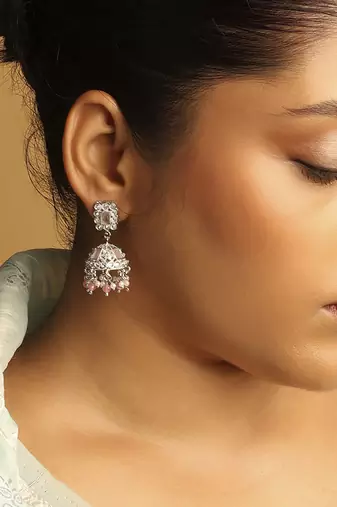 pink alloy jhumki earrings with silver plated kundan work