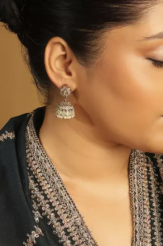 sky blue alloy jhumki with antique gold kundan stones