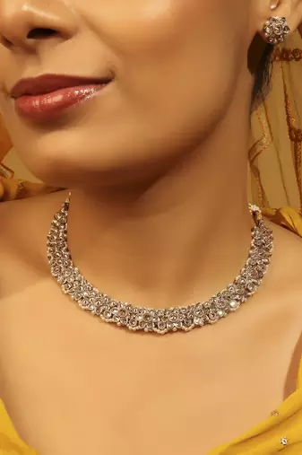 brown alloy choker set with kundan stone work