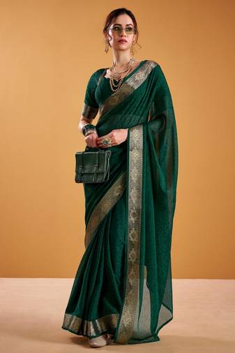 green organza saree with zari work
