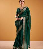 green organza saree with zari work