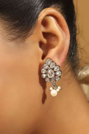brown alloy jhumki earrings with uncut kundan work