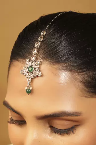 green alloy maang tikka with flower oval design