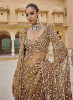 golden net saree with sequins embroidery work 1