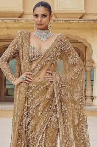 golden net saree with sequins embroidery work