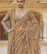 golden net saree with sequins embroidery work