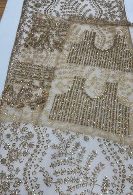 light beige net saree with sequins embroidery work 2