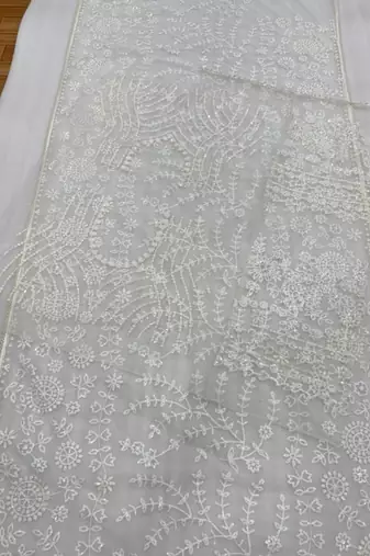off white net saree with sequins embroidery work