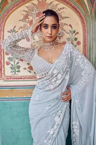 sky blue georgette saree with sequins work