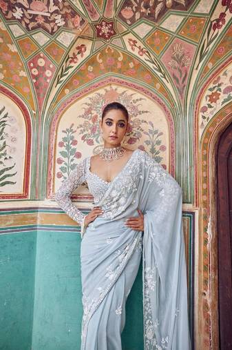 sky blue georgette saree with sequins work