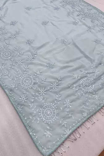 sky blue georgette saree with sequins work