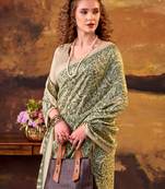 green printed tussar silk saree with classic border