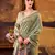 green printed tussar silk saree with classic border