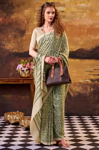 green printed tussar silk saree with classic border