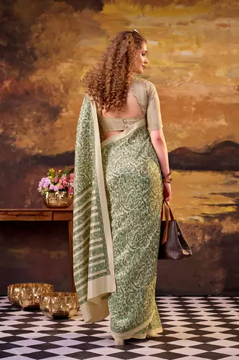 green printed tussar silk saree with classic border