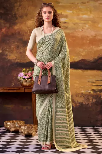 green printed tussar silk saree with classic border