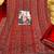 Red heavy rangoli with coading sequence work unstitched suit