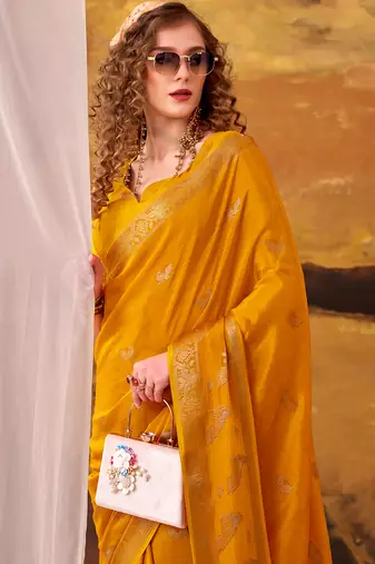bright yellow crepe weaving saree with  zari accents