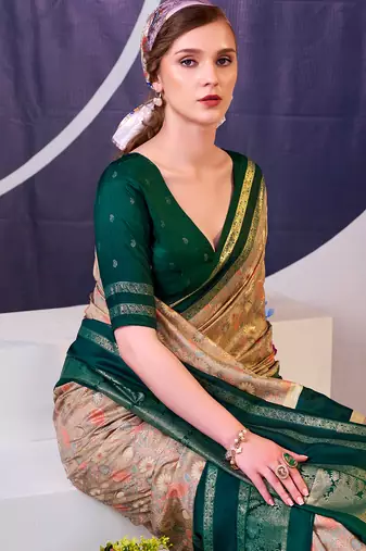 green tussar silk saree with floral prints and subtle foil shine