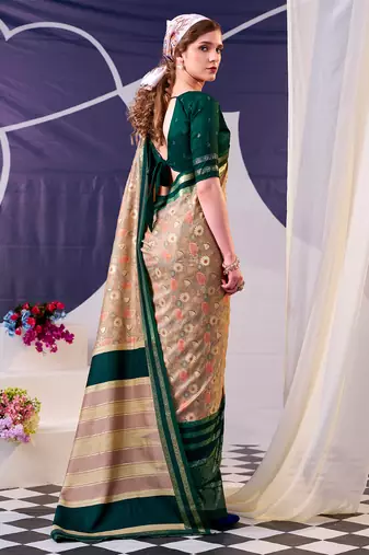 green tussar silk saree with floral prints and subtle foil shine