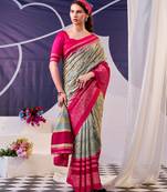 rani pink & olive green tussar silk saree with floral print and foil detailing