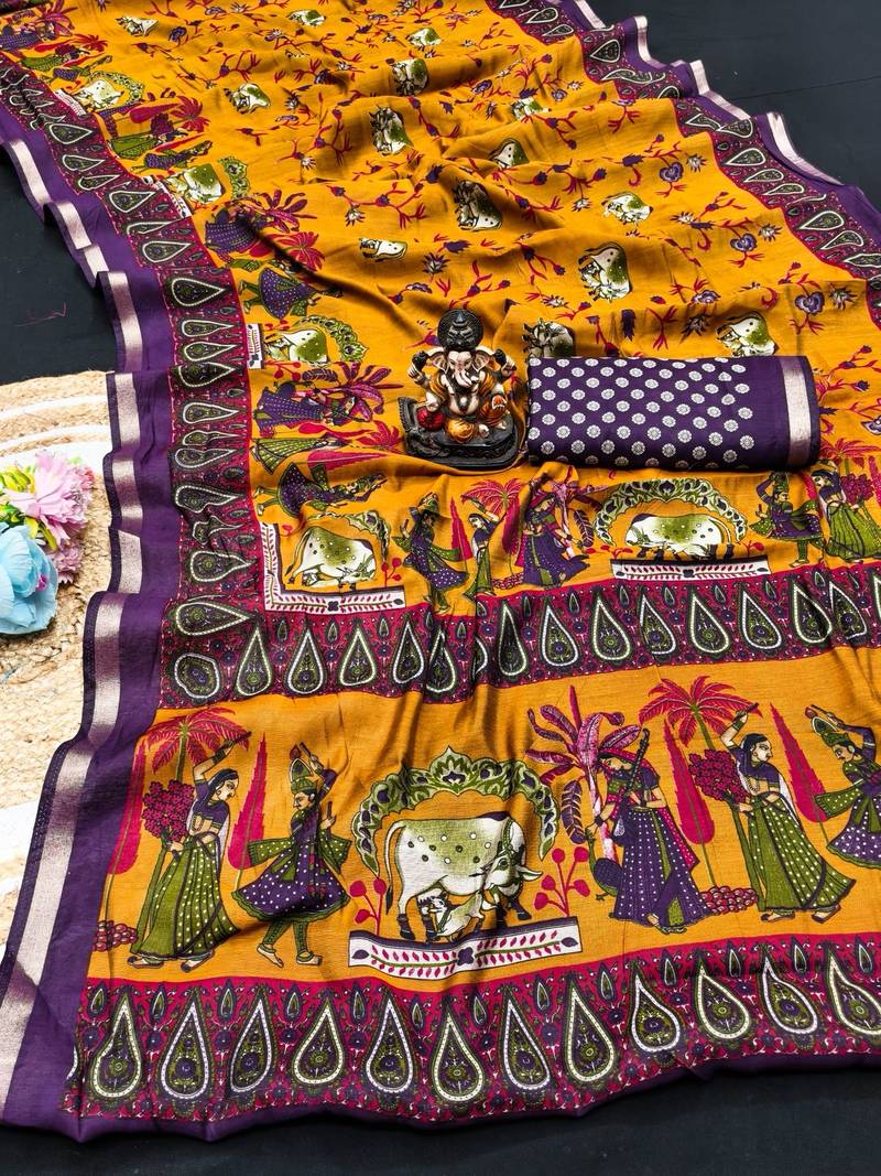 yellow mul cotton kalamkari print saree with traditional border