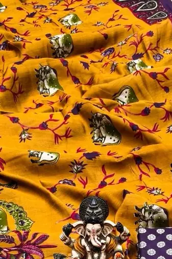 yellow mul cotton kalamkari print saree with traditional border