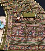 olive green mul cotton kalamkari print saree with floral & peacock motifs