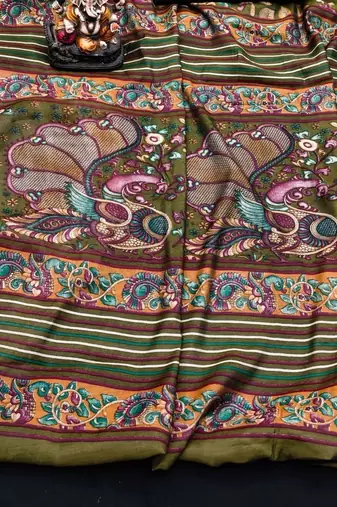 olive green mul cotton kalamkari print saree with floral & peacock motifs