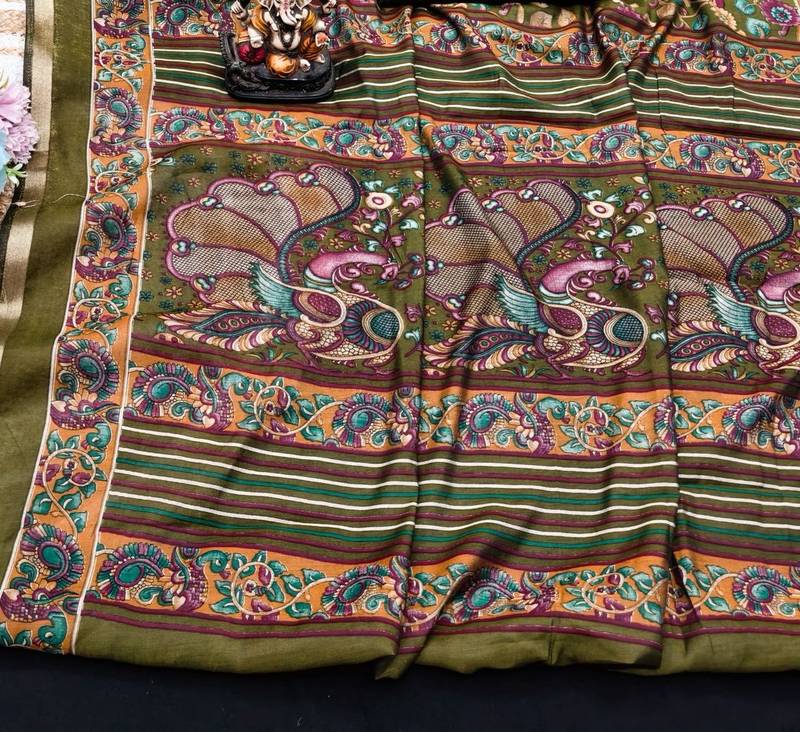 olive green mul cotton kalamkari print saree with floral & peacock motifs