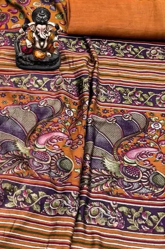 orange mul cotton kalamkari print saree with traditional motifs