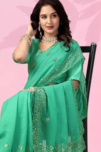 green festive art silk saree with sequin border work