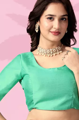 green festive art silk saree with sequin border work
