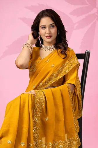 mustard yellow art silk saree with hand embroidery & sequin detailing