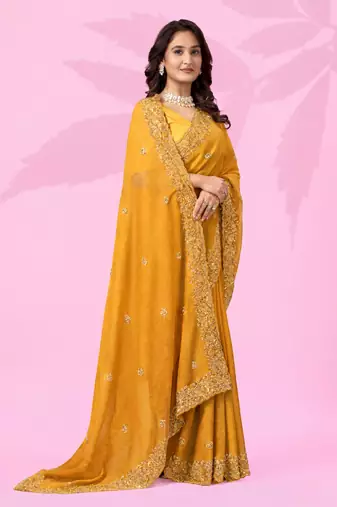 mustard yellow art silk saree with hand embroidery & sequin detailing