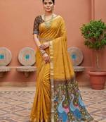 yellow muga cotton saree with peacock ajrakh meenakari pallu