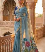sky blue cotton saree with floral designer pallu