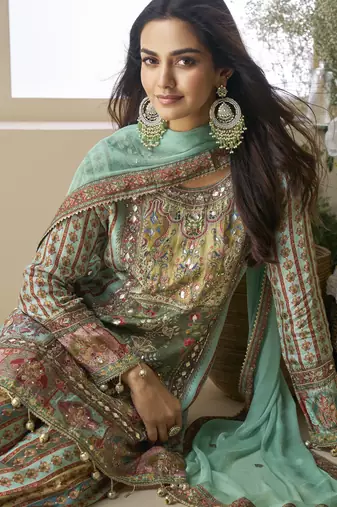 Green color elegant heavy crepe silk digital print suit with aari work & chiffon dupatta
