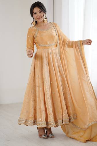 Light orange color elegant fandy silk gown set with sequins coding work, pant & dupatta