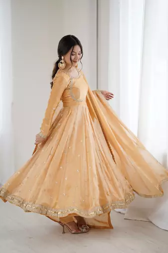Light orangeelegant fandy silk gown set with sequins coding work, pant & dupatta